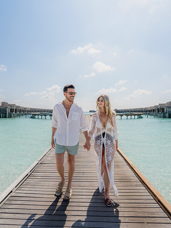 The couple at the Overwater villa at Anantara Kihavah Maldives