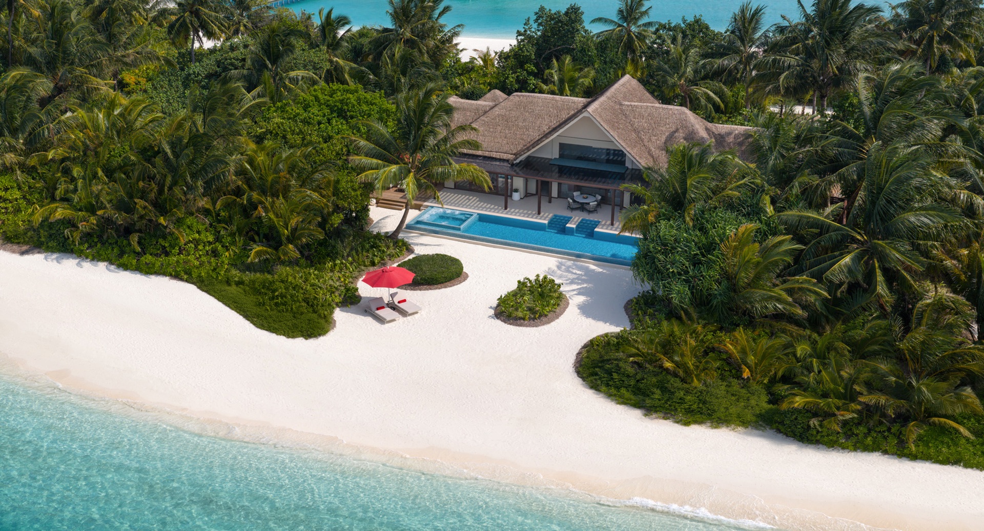 Aerial view of a beach pool villa at Niyama Private Island Maldives set along a white-sand beach