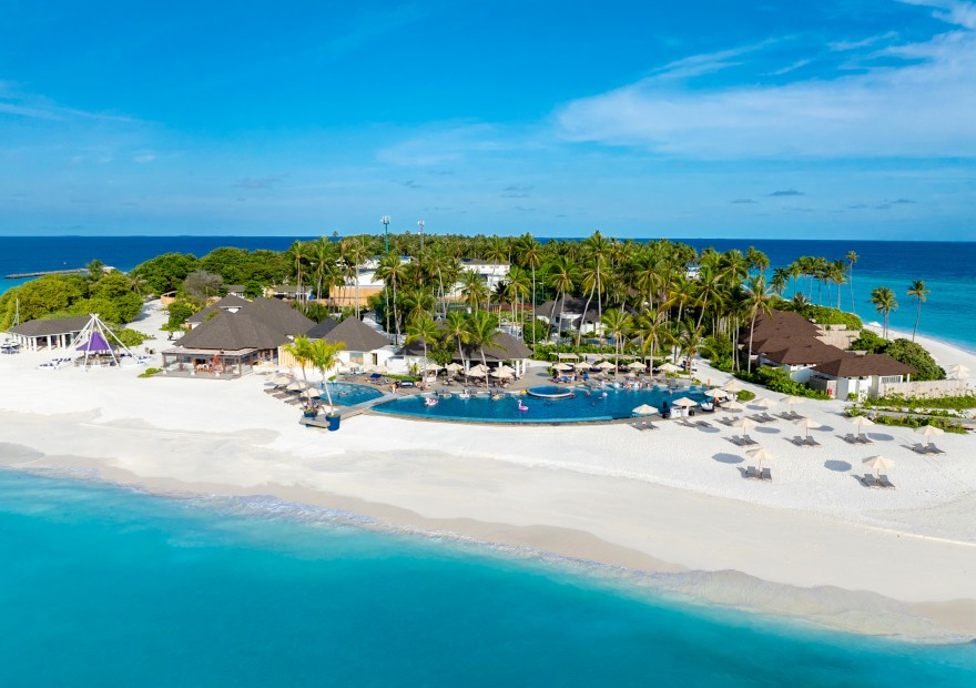 Aerial view of Avan+ Fares Maldives Resort by day