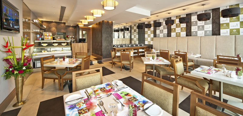 air conditioned cafe with great coffee and vegetarian food options at Oaks Liwa Executive Suites hotel in Abu Dhabi, United Arab Emirates